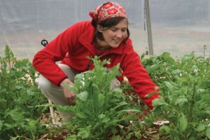 Girl growing food eco-logically