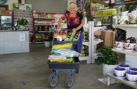 Woman buying fertilisers